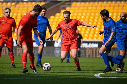 Tecman charity football match action shot
